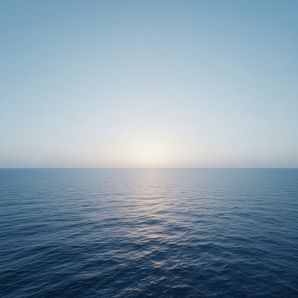 a deep blue calm ocean with gentle waves under a clear sky, soothing and hopeful mood, minimal, photographic